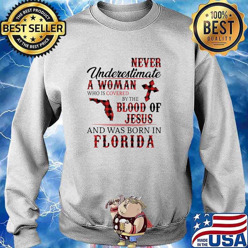 Never underestimate a woman covered by the blood of jesus and was born in florida s Sweater