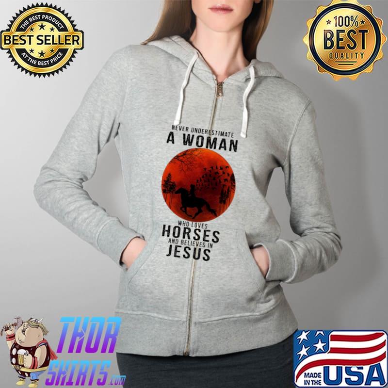 Never Underestimate A Woman Who Loves Horses And Believes In Jesus Blood Moon Shirt Full Zip Hooded