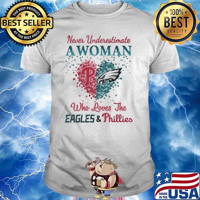 Never underestimate a woman who understands music and loves the Eagles and Phillies shirt