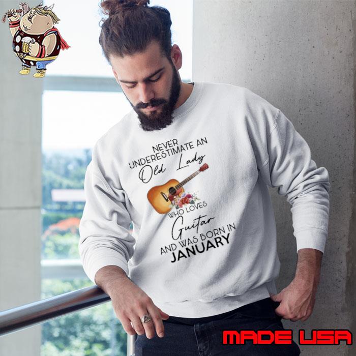 Never underestimate an old lady loves guitar was born in January flower shirt