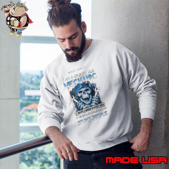 Top walk away a grumpy old mechanic have anger serious dislike for skull shirt