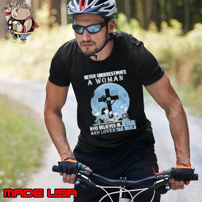 Peanuts Characters Never Underestimate A Woman Who Believes In Jesus And Loves North Carolina Tar Heels Unisex