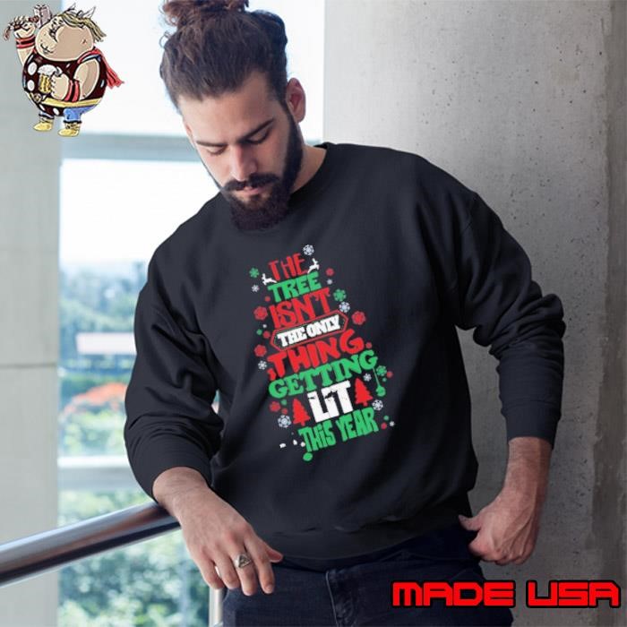 The Free Isn’t The Only Thing Getting Lit This Year Merry Christmas Sweatshirt