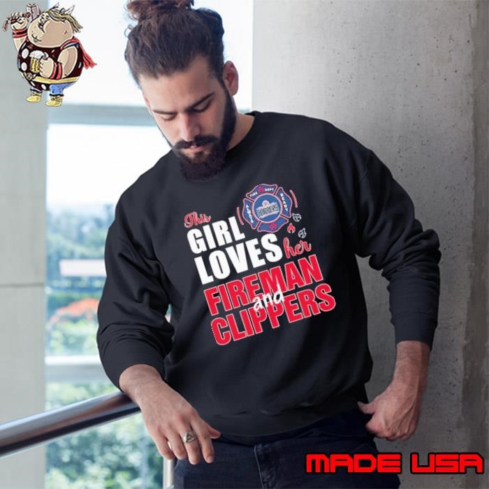 This girl loves her fireman and LA Clippers Sweatshirt