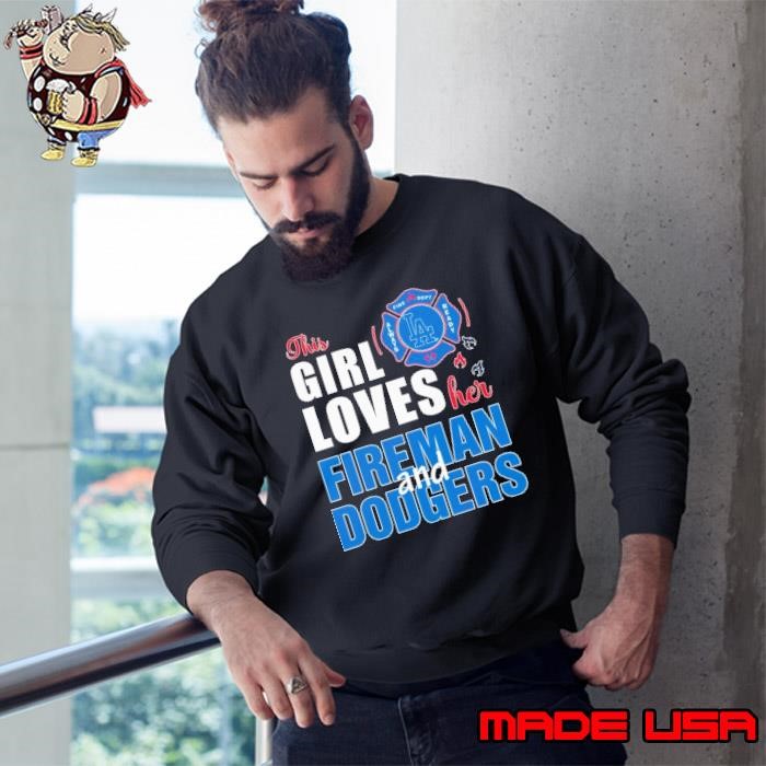 This girl loves her fireman and Los Angeles Dodgers Sweatshirt