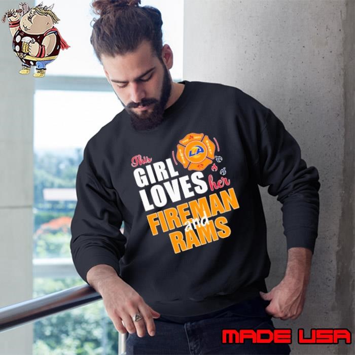 This girl loves her fireman and Los Angeles Rams Sweatshirt