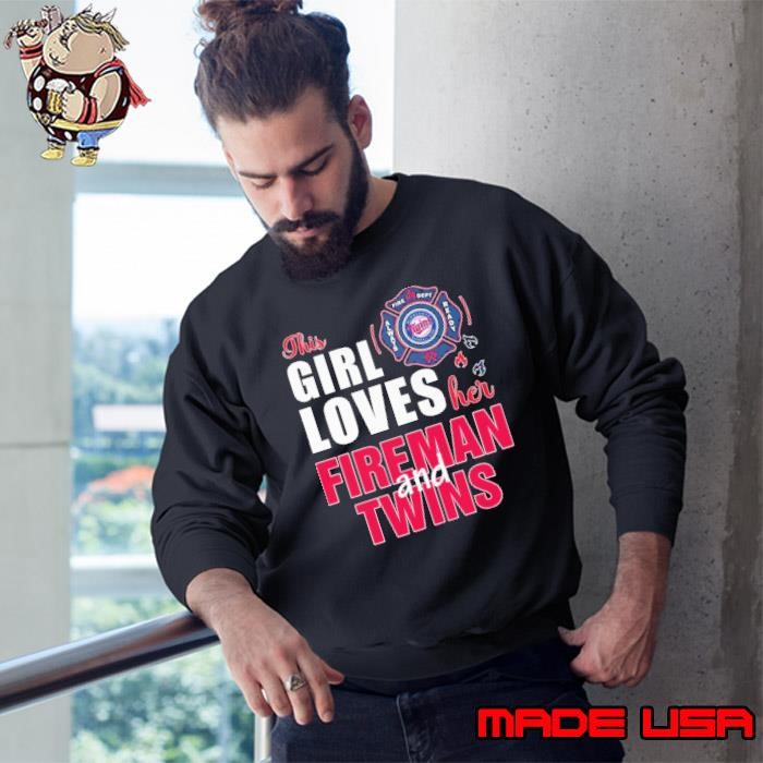 This girl loves her fireman and Minnesota Twins Sweatshirt