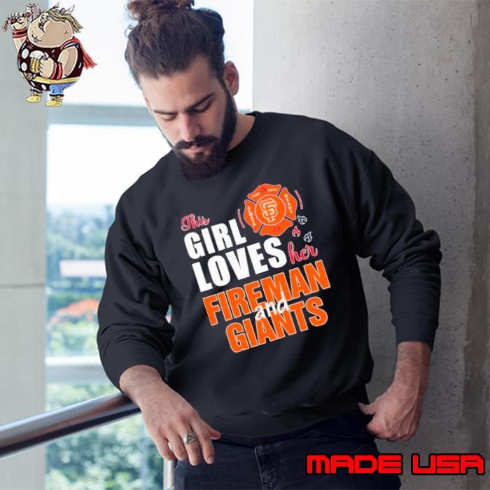 This girl loves her fireman and San Francisco Giants Sweatshirt